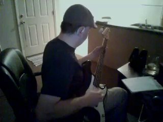 Me playing bass along to First Signal's "When November Falls"