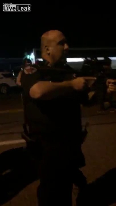 Officer Threatening To Shoot Fergusun Journalist