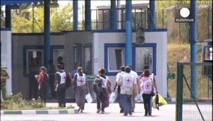 Russian aid trucks bound for Ukraine pass border checkpoint