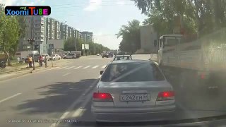 Girl texting walks into oncoming traffic, ends up getting hit then ran over