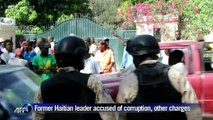 Aristide supporters rally at his home to prevent his arrest