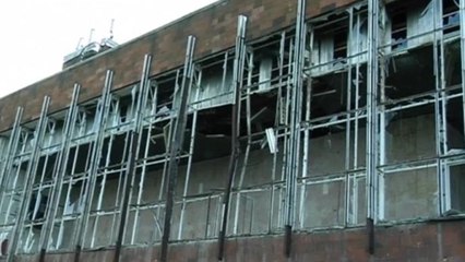 Heavy shelling kills two, destroys buildings