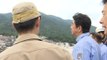 Abe tours landslide ravaged Hiroshima
