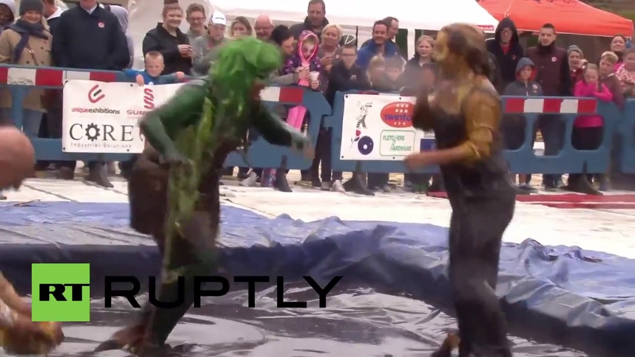 UK: Watch these wrestlers grapple in a giant pool of gravy