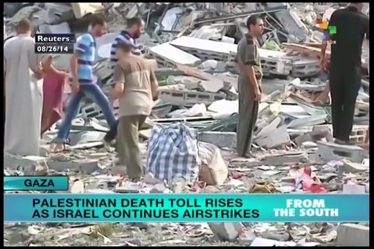 Israeli air strikes destoy 13 story residential building in Gaza