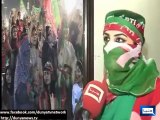 Woman wearing PTI flag themed in Azadi March