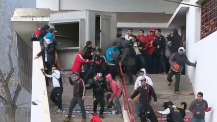 Football fans in Chile attack riot police