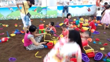 Funny kids -a lot of kids playing with sand