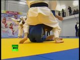 'Judo Knight' Putin shows off martial arts skills in wrestling bout