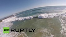 USA: See drone soar above giant hurricane waves