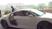 Virat Kohli drives Chris Gayle around Delhi in his Audi R8