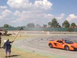 Cristiano Ronaldo shooting balls on the track with Jenson Button