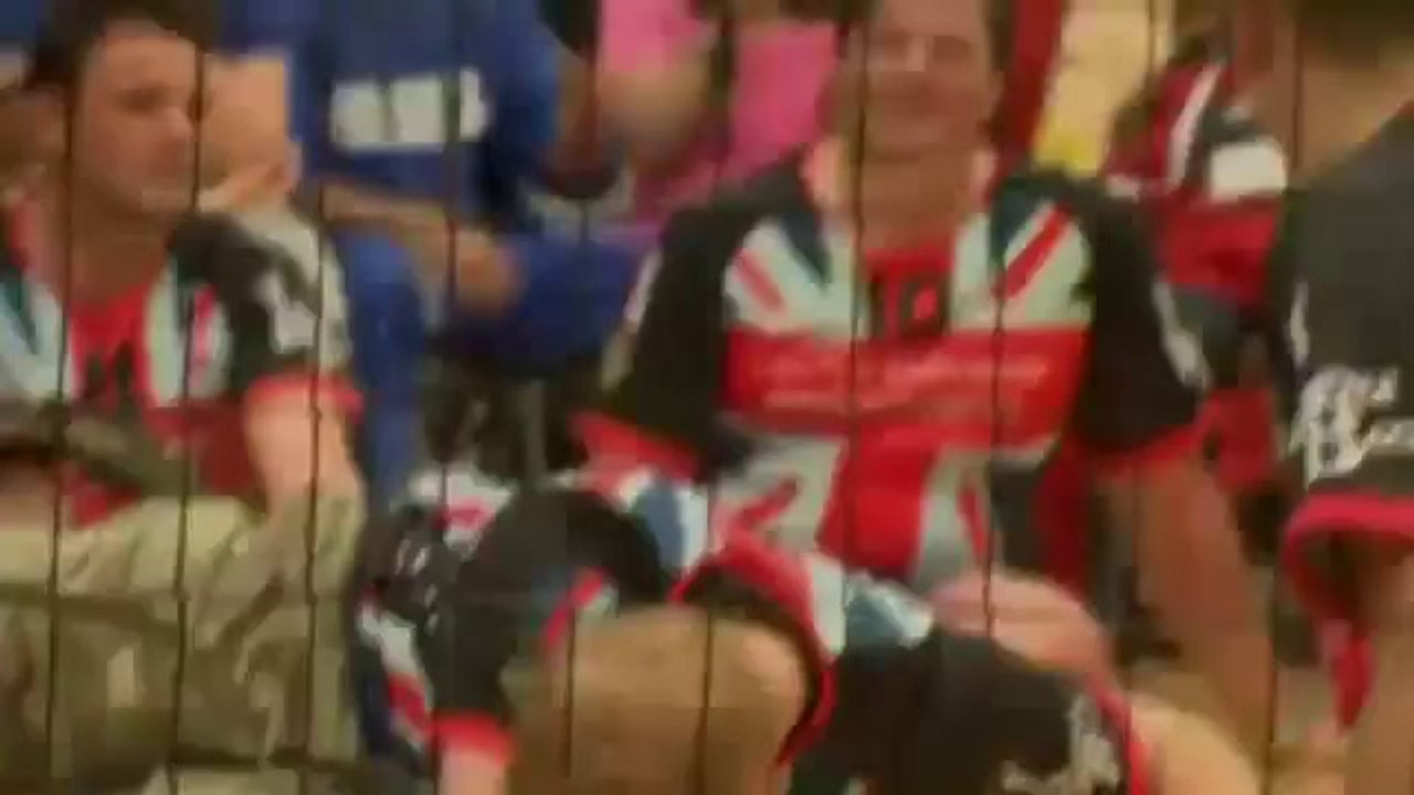 Harry plays sitting volleyball