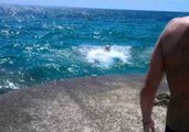 Overjoyed Dog Leaps Into Sea