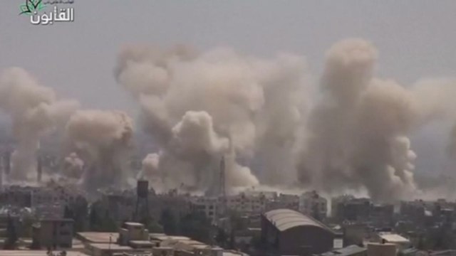 Syrian forces reportedly escalate assault on rebel-held Damascus district