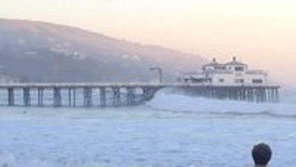 Surfer Plays With Death