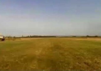 Agricultural Aircraft Makes Close Spraying Fly-By