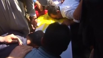 Hundreds mourn the loss of a Kurdish fighter killed by IS