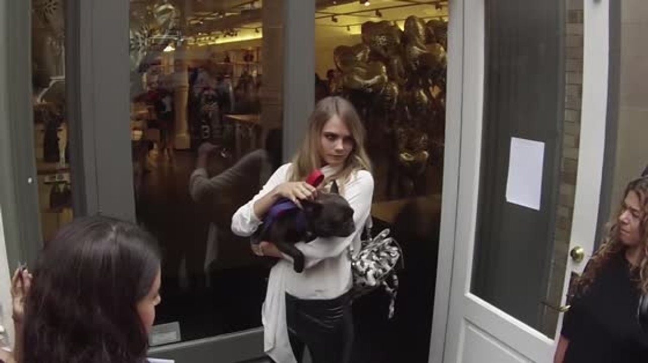 Cara Delevingne Gets A New Pal During Fashion Week