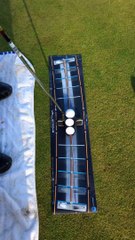 Benjamin Hebert et la plaque de putting Arc To Arc. Un grand moment !