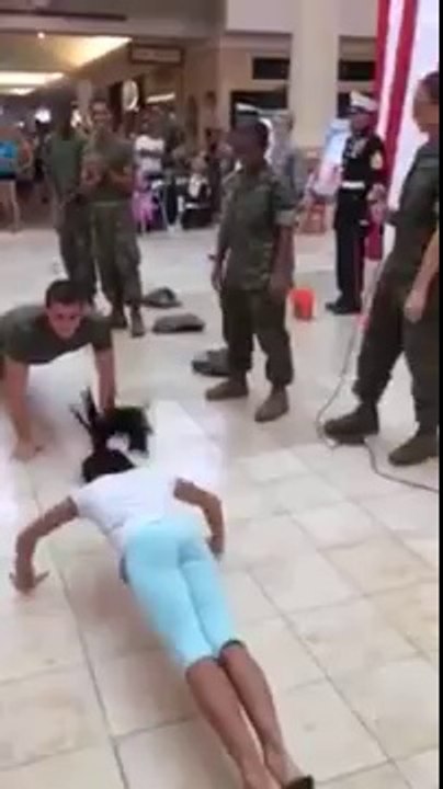Little Girl Competes with Army Cadet At Push Up Challenge