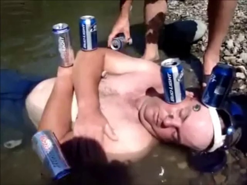 Drunk guy takes a nap in the river
