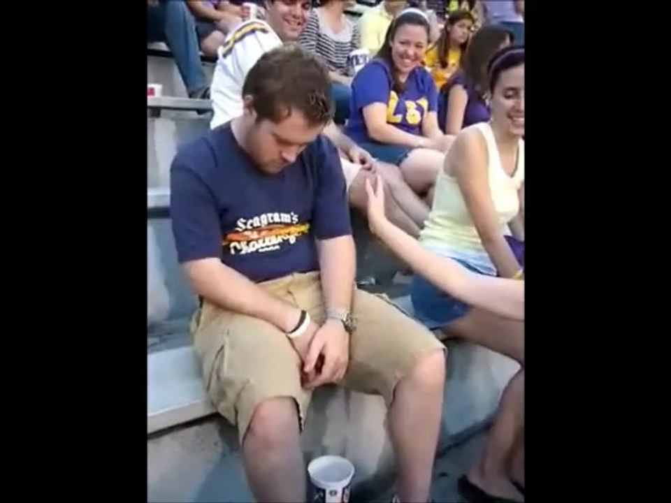 Drunk fan in a stadium