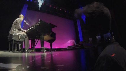 Nick Merico performs Let Her Go on the piano..