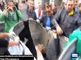 Ukrainian protesters dump Vitaly Zhuravsky into rubbish
