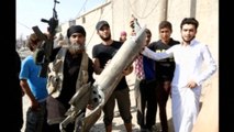 Islamic State fighters shoot down a Syrian warplane