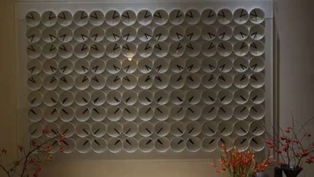 Amazing giant clock build with 135 little clocks. So so beautiful...