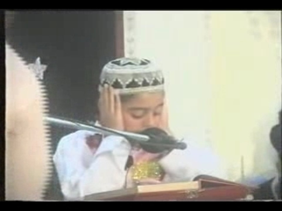 Enfant récitant le coran