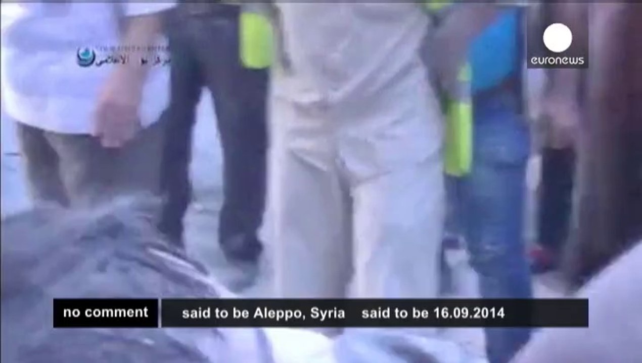 Syria: boy rescued from rubble in aftermath of Aleppo bombing