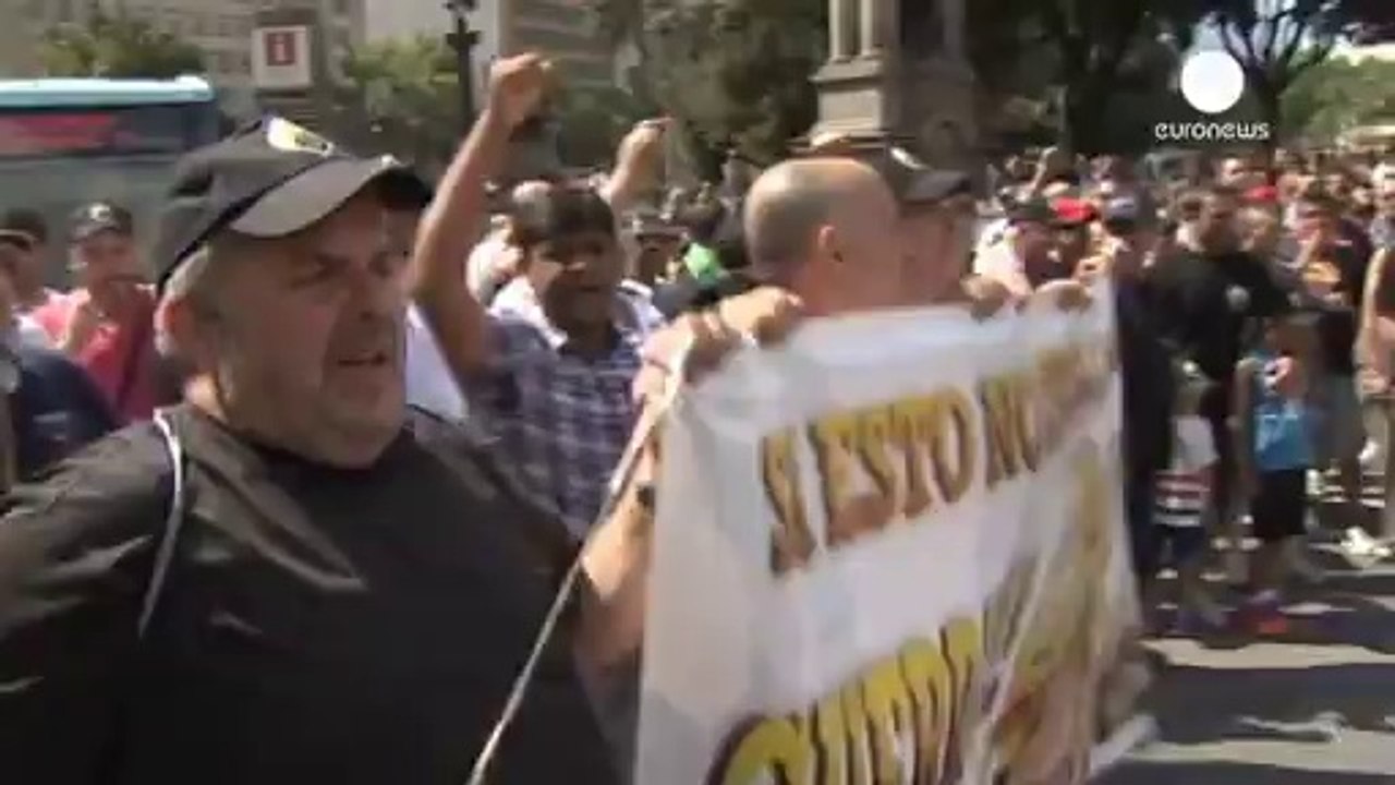 Taxi battle: traditional cabbies take on car-sharing service Uber