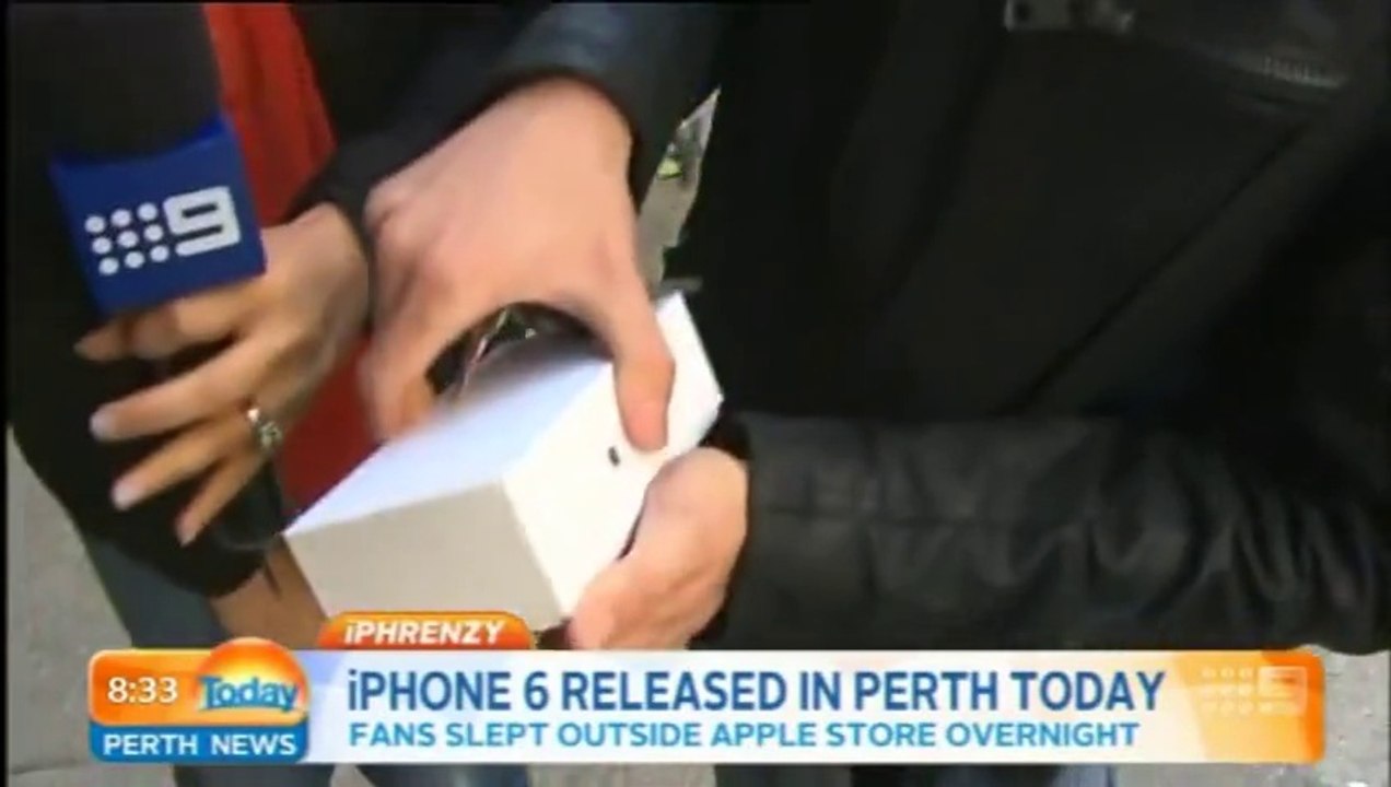 Crazy iPhone 6 FAIL : First person to buy an iPhone 6  immediately drops it during TV interview