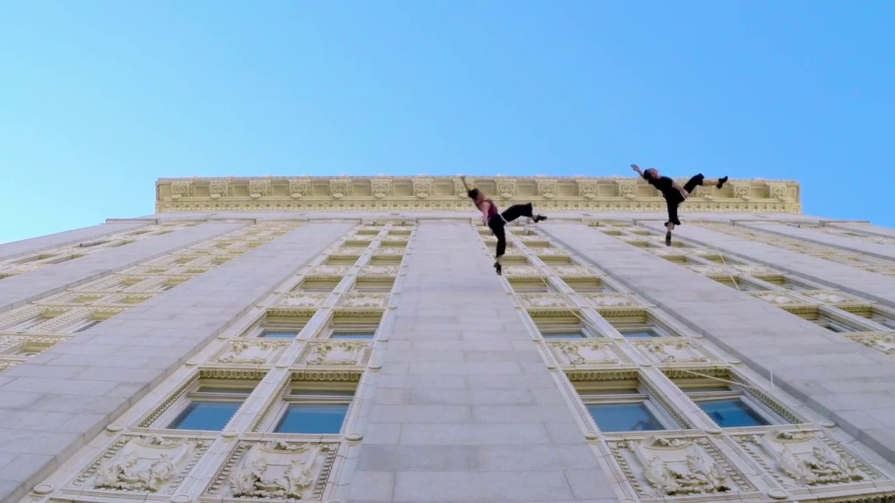 So crazy dancers walking on The Walls Of City Hall