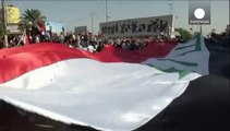 Protestas en Bagdad contra la intervención en Irak, mientras prosiguen bombardeos contra el EI