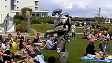 A robot punches a drunk guy
