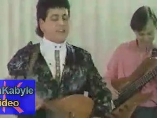 Rabah Asma "Netsargou" clip Kabyle(1990)