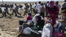 Thousands of Syrian Kurds flee ISIL