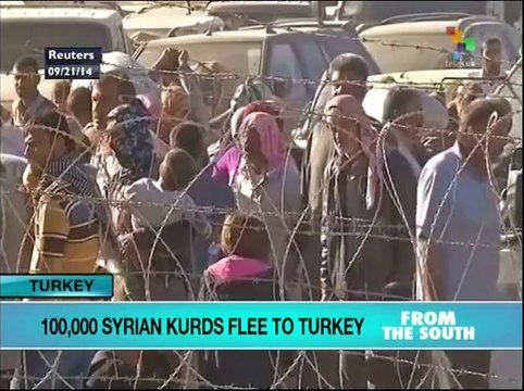 100,000 Kurds flee Syria for Turkey, UN says