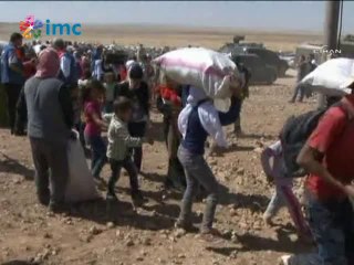 Sınırı geçen Rojavalılar: Türkiye IŞİD'e tank ve silah taşıyor