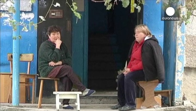 Ukrainian army and rebel troops pull back to create buffer zone