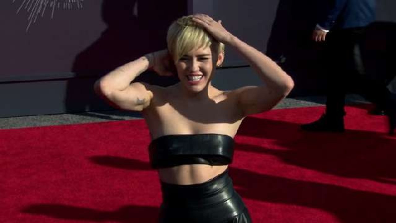 Couple Jailed for Robbing Miley Cyrus