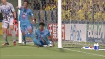 Lucky Kobayashi clears off the line