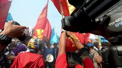 Indonesians rally outside parliament against election plan