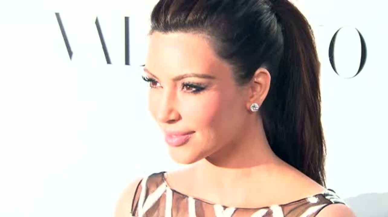 Kim Kardashian Tackled at Paris Fashion Week Show