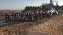 Turkish Kurds clash with police on border with Syria as Syrian Kurds stream into Turkey