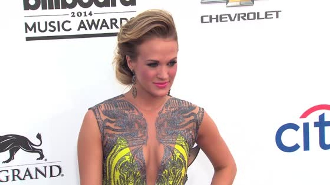 Carrie Underwood Says Pregnancy is 'Still Weird'