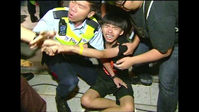 HK democracy protesters hold out after storming govt HQ
